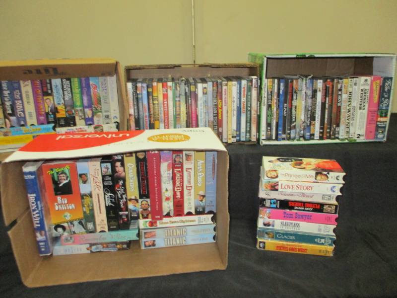 lot 85 image: Tons of various DVDs and VHS Movies