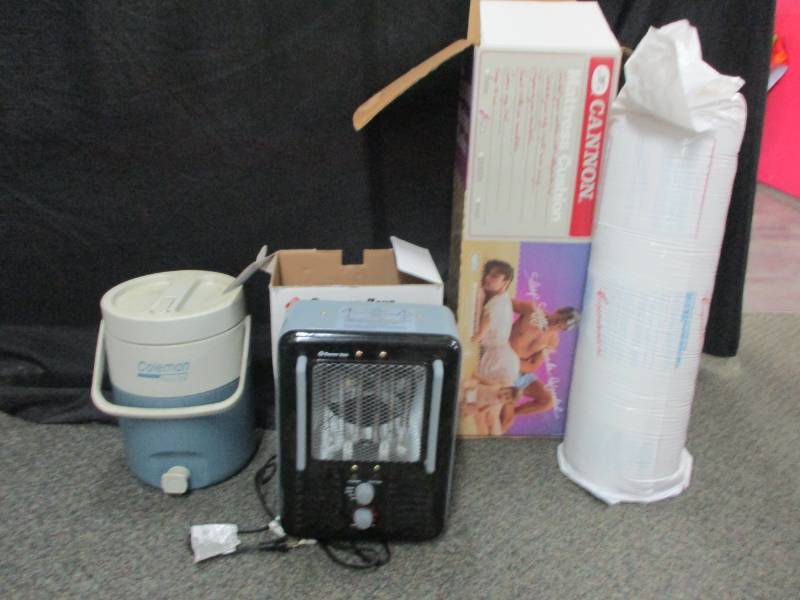 lot 93 image: Electric Heater unused, matress pad unused and large water jug