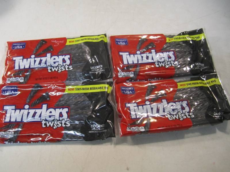 lot 128 image: 4 Packs of Twizzlers Twists Black L...