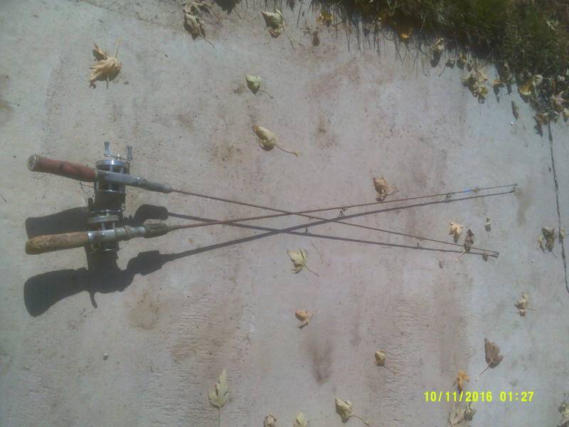 2 STEEL FISHING RODS