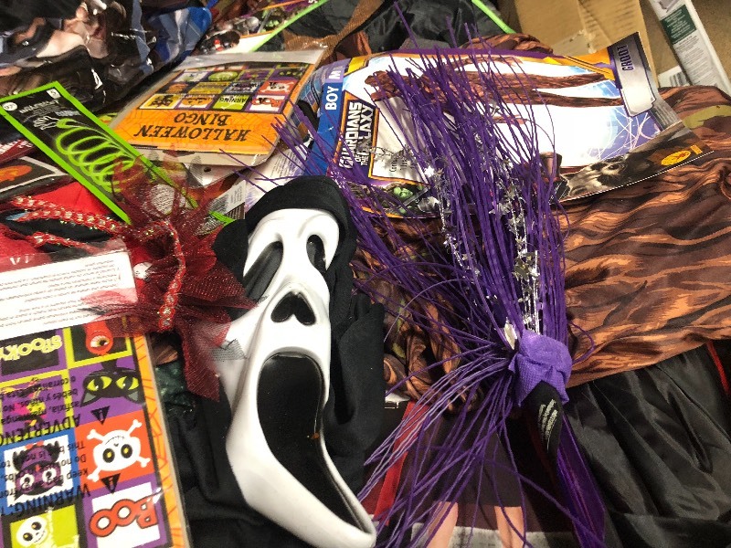 lot 128 image: Gaylord full of Halloween items- customs, decorations, party favors, and more