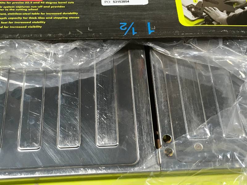 lot 48 image: Ryobi 7 in. 4.8 Amp Tabletop Tile Saw  In good condition.