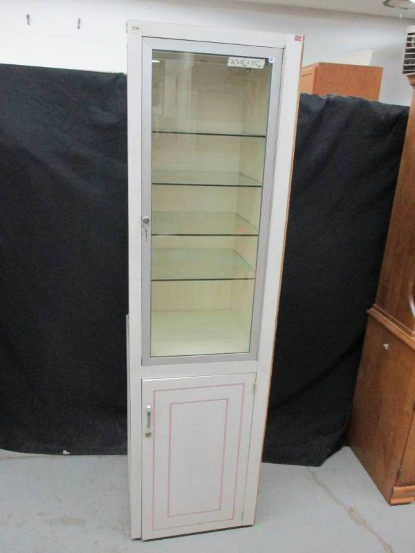 Display Cabinet (top and bottom locks, has keys)