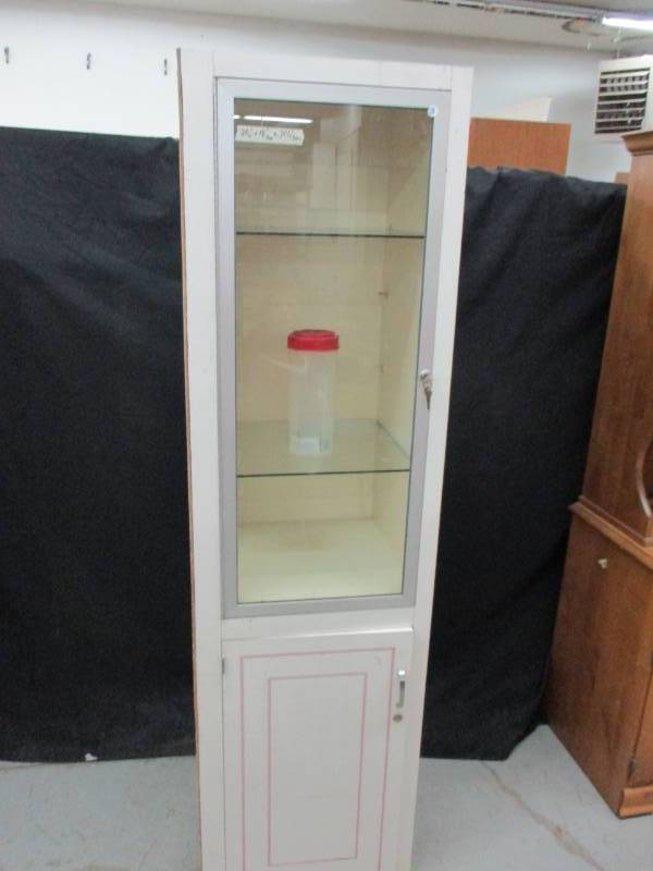 Display Cabinet (top and bottom locks, has keys)