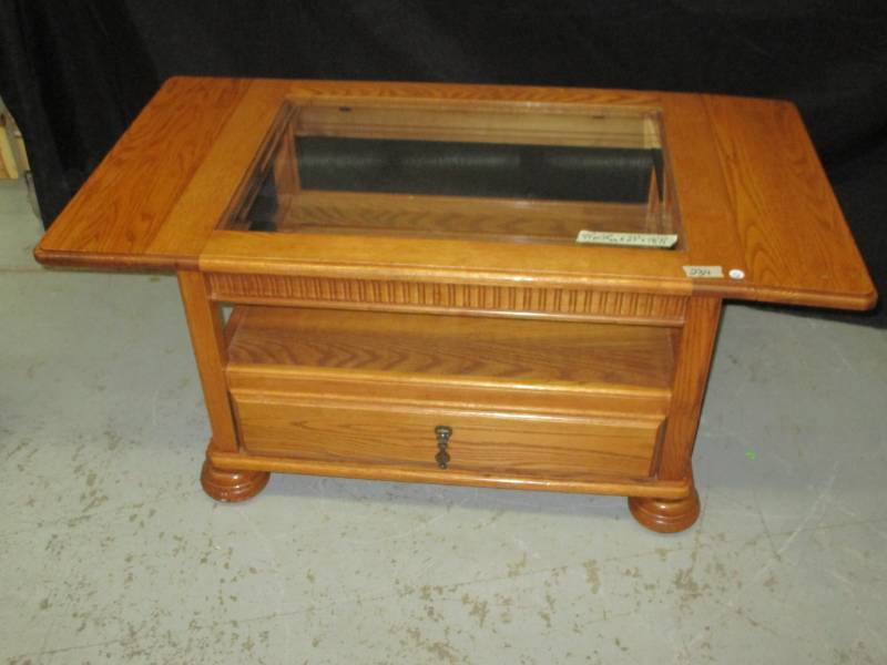 Nice wooden End Table with Beveled glass top, side extentions, and a drawer