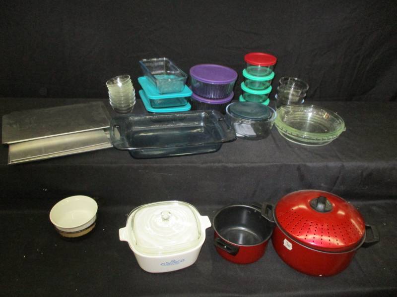 Various Pyrex, baking and storing dishes and some pots and pans