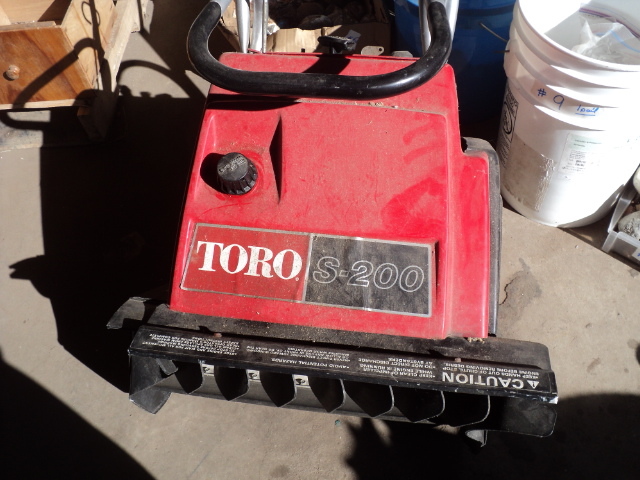 lot 10 image: Toro S-200 snow blower - turns over...