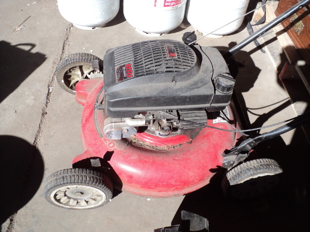 lot 11 image: MTD 5 hp lawn mower - turns over...