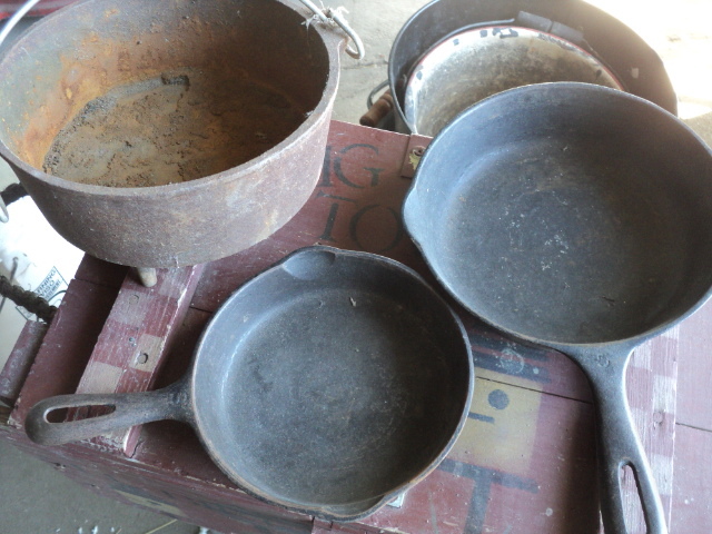 lot 16 image: 2 cast iron fry pans and 1 pot...