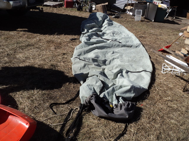 lot 17 image: boat cover 24 long - has 2 holes -...