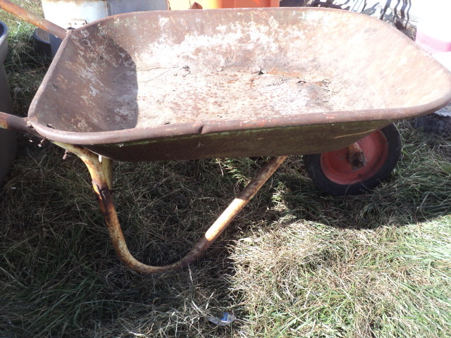 lot 38 image: vintage wheel barrow...