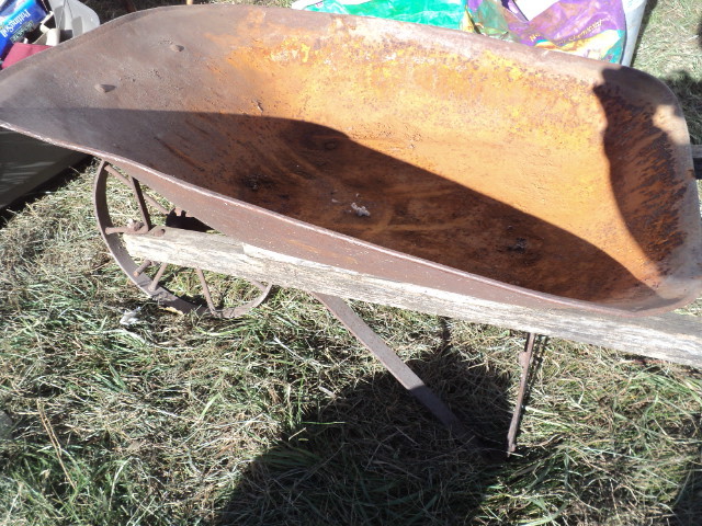 lot 40 image: vintage wheel barrow...