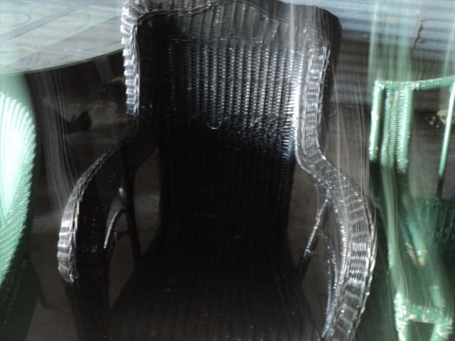 lot 73 image: black wicker rocking chair...
