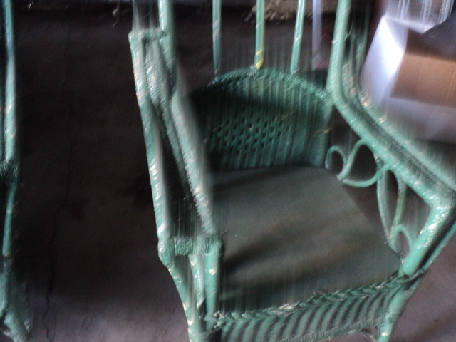 lot 75 image: green wicker chair with wood seat...