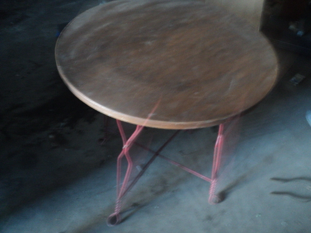 lot 76 image: wood top patio table with red metal...
