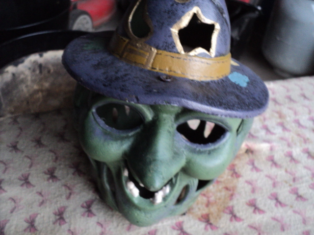 lot 99 image: cast iron witch...