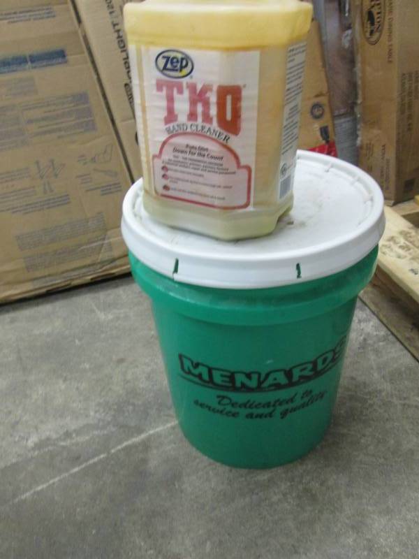 lot 115 image: Bucket of Pine Sol, Bottle of Zep H...