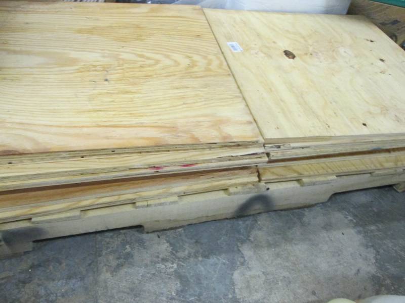 lot 124 image: Lot of 2 Stacks Plywood 2x2 foot...