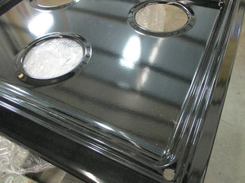 lot 39 image: Black Stove Top Cover