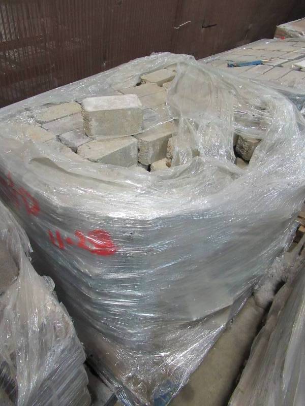 lot 38 image: SplitRock Small 3.5 in. x 3.5 in. x 7 in. CharcoalTan Concrete Garden Wall Block Approximately (288 Pcs.  24.5 Face ft.  Pallet)