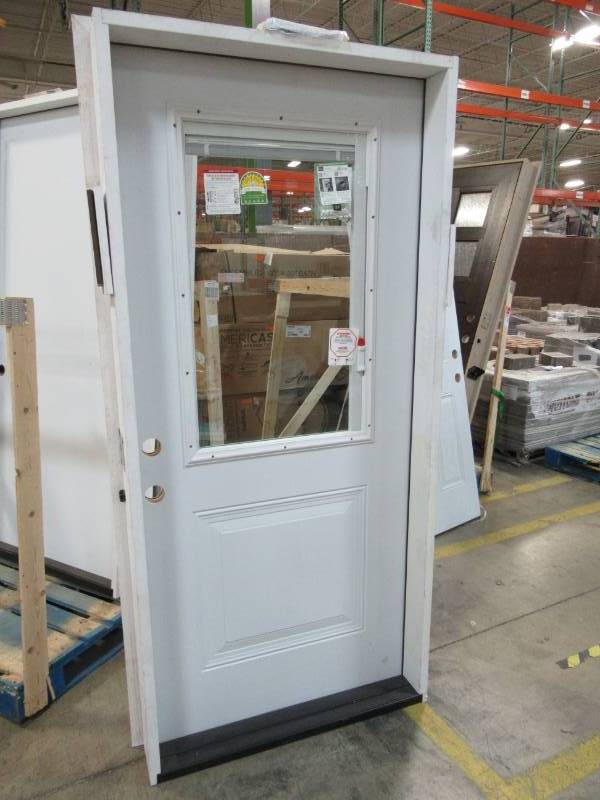 lot 64 image: Steves & Sons 36 in. x 80 in. 1-Panel 12 Lite Mini-Blind Primed White Steel Prehung Front Door