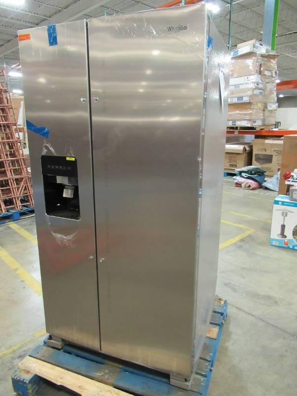 lot 75 image: Dented - Whirlpool 24.6-cu ft Side-by-Side Refrigerator with Ice Maker (Fingerprint-Resistant Stainless Steel) WRS315SDHZ