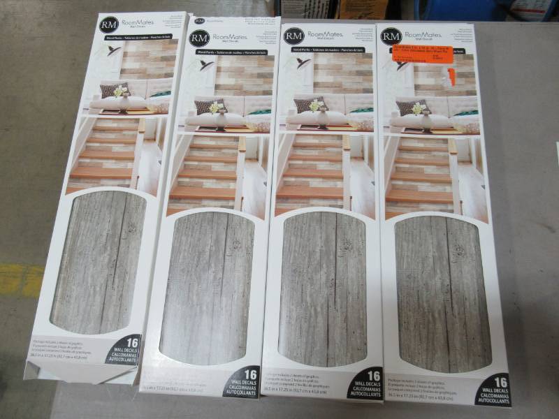 lot 128 image: Four Boxes RoomMates 5 in. x 19 in. 16-Piece Multi-Color Distressed Barn Wood Plank Peel and Stick Wall Decals RMK3695GM