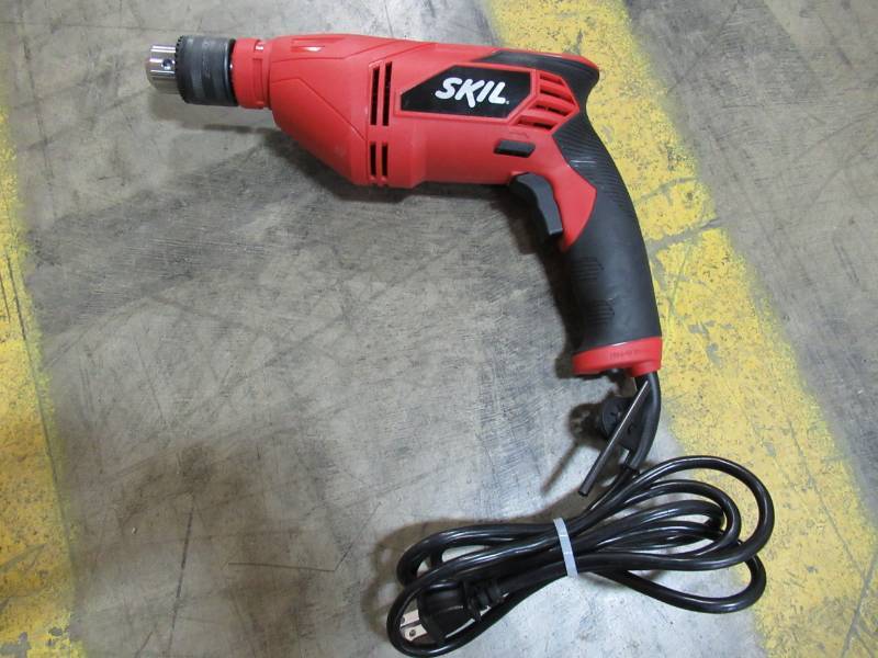 lot 153 image: Skil 6.5 Amp Corded Electric 38 in. Variable Speed DrillDriver, Model 6277-02