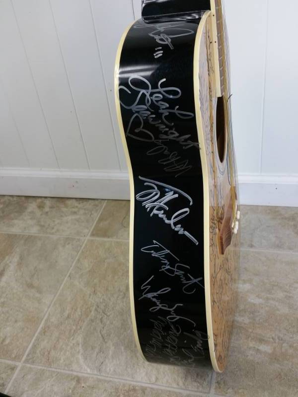lot 15A image: Grand Ole Opry Displayed Autographed Country Music Gibson Guitar