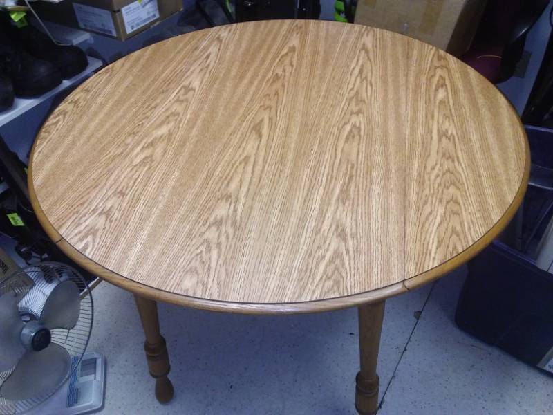 lot 48 image: Round drop leaf table - excellent condition.