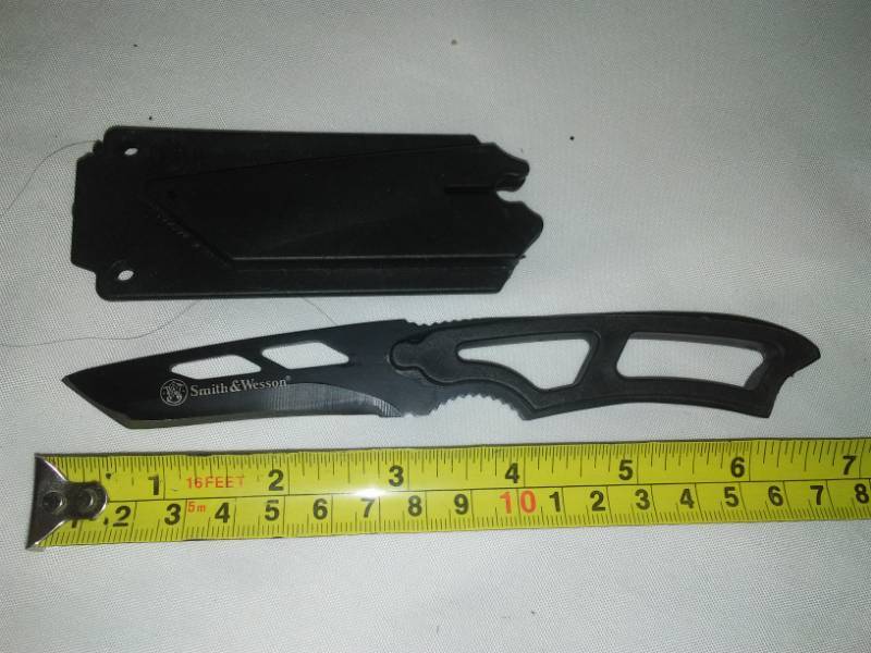 lot 53 image: Smith & Wesson straight knife with poly sheath.