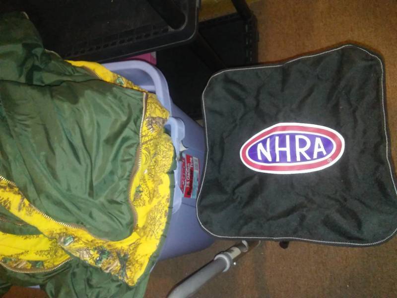 lot 128 image: NHRA collapsible stool, sleeping bag and more