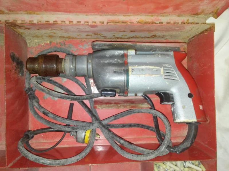 lot 98 image: Hilti commercial grade drill in case. Model TM 7.