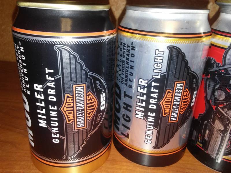 lot 131 image: 9 Harley-Davidson beer cans 95th Anniversary.