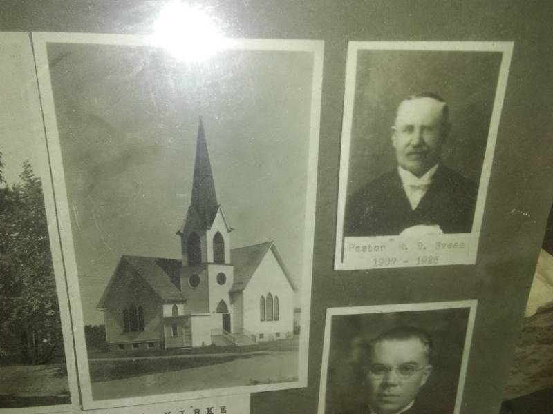 lot 140 image: Aurdal Lutheran Church 1874 - 1934  pastors. Picture behind portraits Lutherske Kirke.