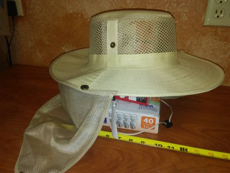 lot 149 image: Safari hat with netting, new with tags.