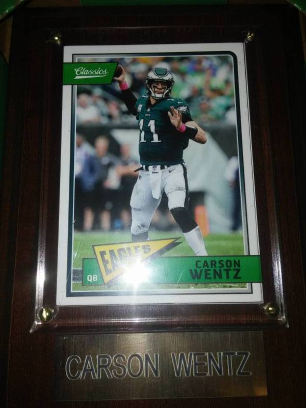 lot 217 image: Carson Wentz rookie season wood plaque.