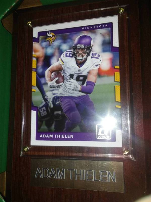 lot 218 image: Adam Thielen Minnesota Vikings wood plaque.