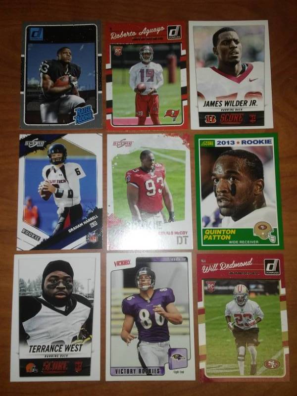 lot 220 image: 9 NFL rookie cards Todd Heap, Washington, Patton, McCoy and more.