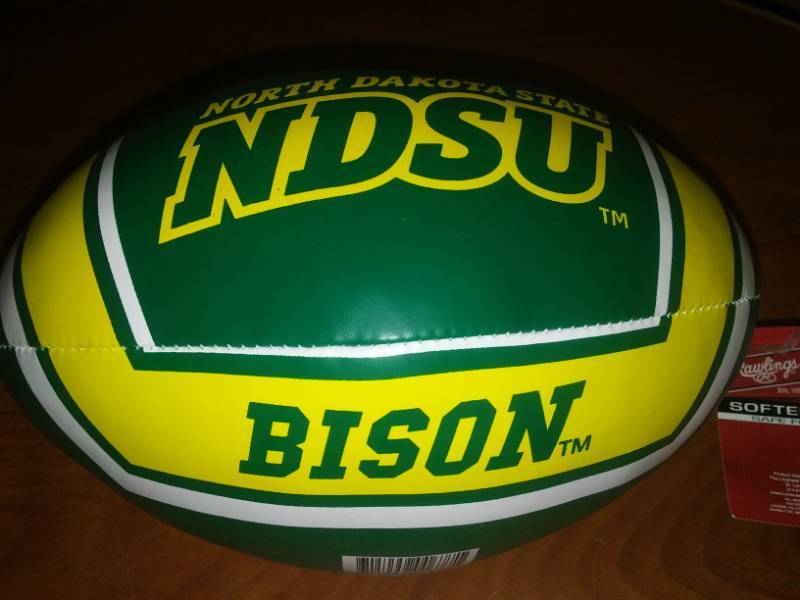 lot 221 image: NDSU Bison Softee football. Rawlings.