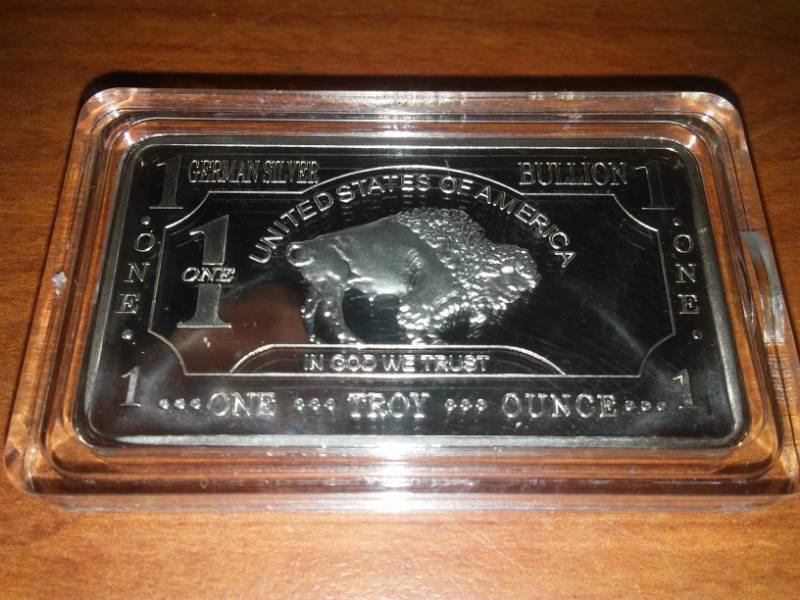 lot 224 image: NDSU Bison silver one troy ounce come in German mint.