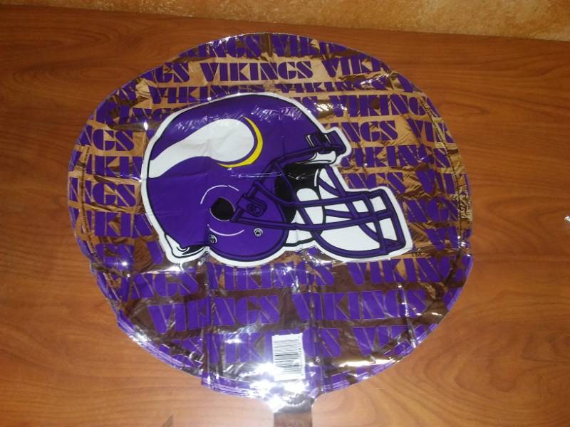 lot 228 image: 24 Minnesota Vikings mylar helium balloons.