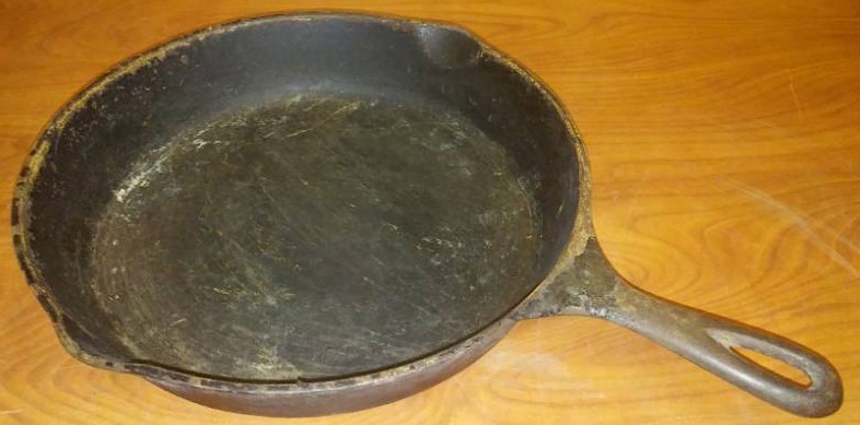 lot 235 image: 12 inch vintage cast iron fry pan.