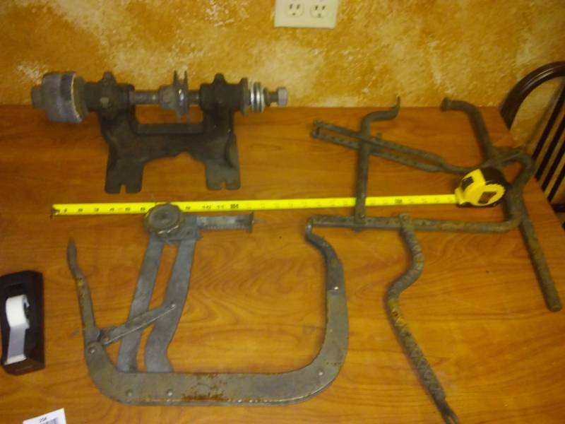 lot 254 image: Grinder base, clamp and Brake puller, very large pieces.