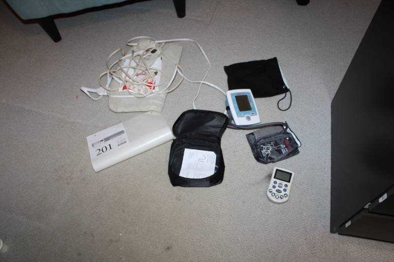 lot 201 image: Empi Heating Pad, CVS Pharmacy Blood Pressure Gauge