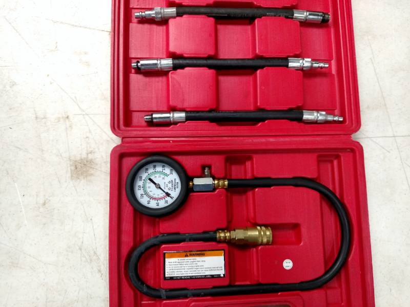 lot 58 image: U.S. General Compression Tester...