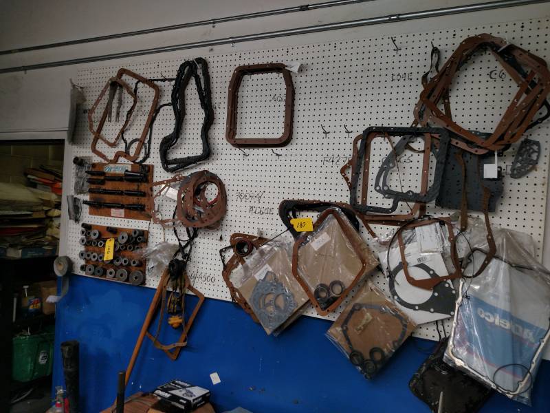 lot 187 image: Asstd Transmission Parts on Wall...