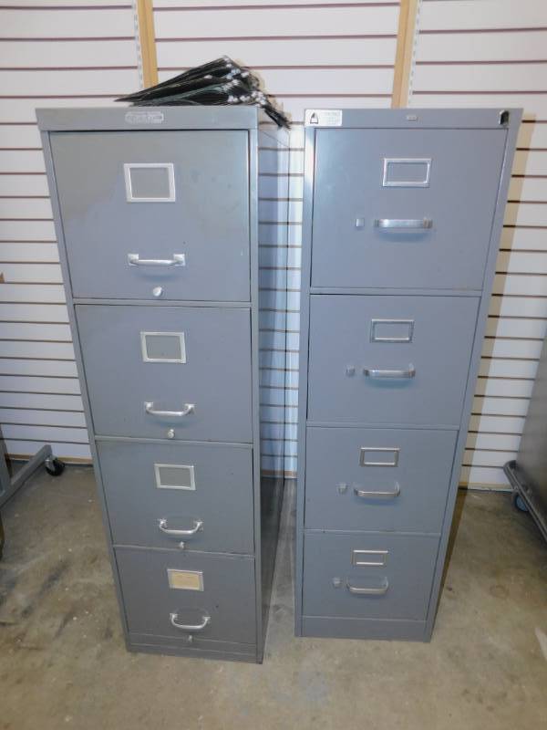 Two Green Four Drawer File Cabinets
