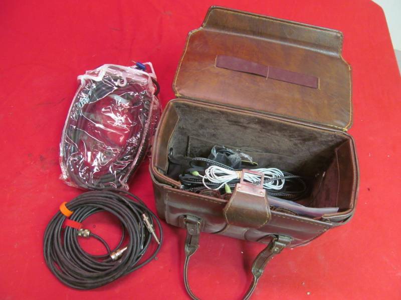 lot 39 image: Variety of Coaxial cords, speaker cords in leather brown case