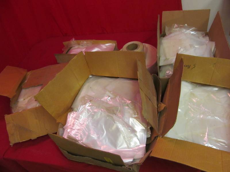 lot 77 image: Impulse sealer, 4 boxes of 7x11 bags 10,000 qty., 2 rolls of continuous bags, 6 12 x 17 bags